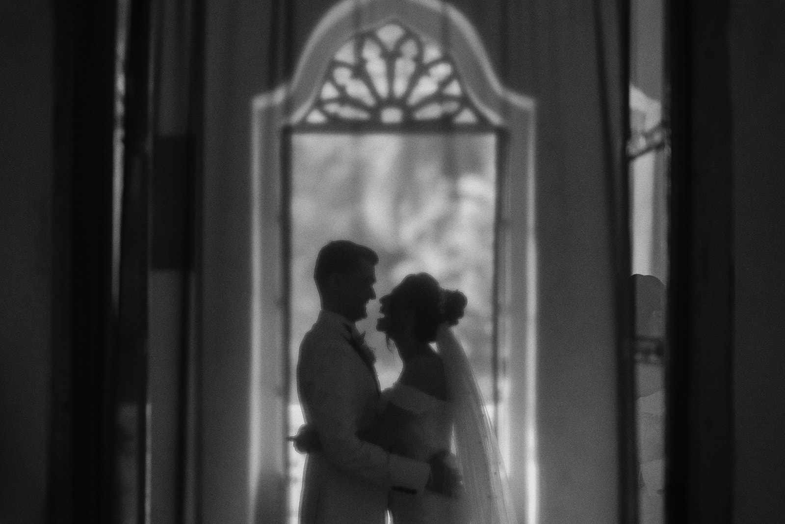 a boho wedding photographer captures a candid moment at a rustic venue