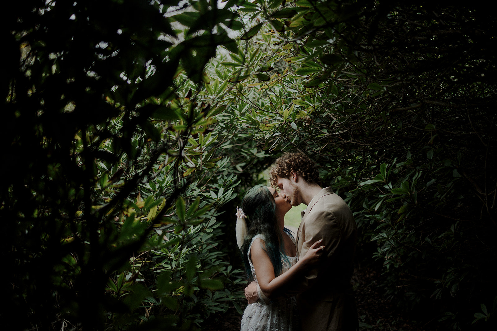 an outdoor wedding photograph capturing an intimate moment by DARIUS N FERNANDES