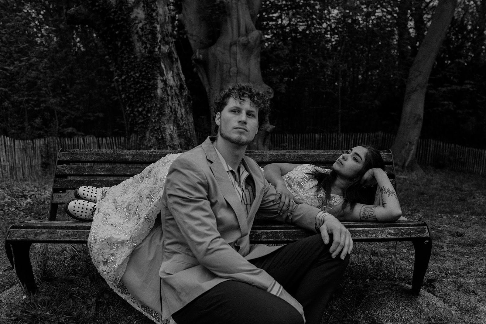 a luxury wedding photograph of a bride and groom posing outdoors